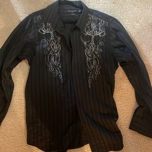 Dress button down size 2XL. Bought over seas. Clean and too small for me now